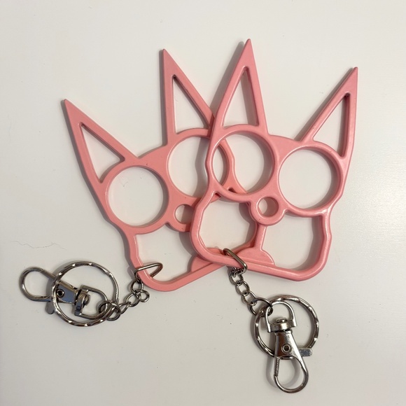 PINK SELF DEFENSE CAT POINTY EARS "BRASS KNUCKLES" KEYCHAIN. As seen in, YOU - Picture 1 of 1